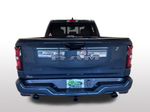 2026 Ram 1500 Big Horn/Lone Star — Blue Metallic exterior view 4, for sale at Ryan CDJR Buffalo in Buffalo, MN