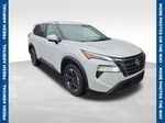 2025 Nissan Rogue SV — White Pearl primary exterior view, for sale at McGrath Ford in Hiawatha, IA