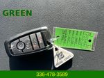 2023 Ford F-150 XLT — Black Metallic interior and detail view 9, for sale at Green Ford in Greensboro, NC