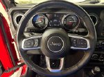 2022 Jeep Wrangler Unlimited Sahara 4xe — Red Clearcoat interior and detail view 18, for sale at Courtesy Nissan of Mesa in Mesa, AZ