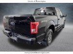 2016 Ford F-150 XLT — Shadow Black exterior view 6, for sale at Lincoln of Bloomington in Bloomington, MN