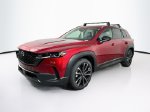 2026 Mazda CX-50 2.5 S Premium — Red Crystal primary exterior view, for sale at Gerald Jones Honda in Augusta, GA