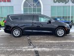 2024 Chrysler Pacifica Touring L — Diamond Black exterior view 4, for sale at Williams Brothers Dodge Chrysler Jeep Ram of Dundee in Dundee, MI