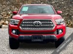 2016 Toyota Tacoma TRD Off-Road — Barcelona Red Metallic exterior view 3, for sale at A Better Way Wholesale Autos in Naugatuck, CT