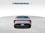 2026 Kia K4 LXS — Snow White Pearl exterior view 7, for sale at McGrath Ford in Hiawatha, IA