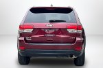 2021 Jeep Grand Cherokee Laredo E — Velvet exterior view 6, for sale at Lakeside Automotive Group in Spring Lake, MI
