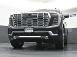 2026 GMC Yukon Denali — Onyx Black exterior view 7, for sale at McGrath Ford in Hiawatha, IA