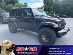 2024 Jeep Wrangler Rubicon — Black Clearcoat primary exterior view, for sale at Autostar CDJR of Hendersonville in Hendersonville, NC