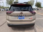 2026 Nissan Rogue Rock Creek — Baja Storm Metallic exterior view 7, for sale at Courtesy Nissan of Mesa in Mesa, AZ