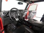 2015 Jeep Wrangler Unlimited Freedom Edition — Red interior and detail view 13, for sale at RDS Ineos Grenadier in Devon, PA