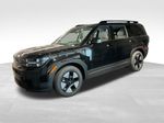 2026 Hyundai Santa Fe Hybrid SEL — Phantom Black exterior view 7, for sale at McGrath Ford in Hiawatha, IA