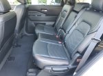 2024 Nissan Pathfinder Platinum — Pearl White interior and detail view 12, for sale at Downtown Nashville Nissan in Nashville, TN