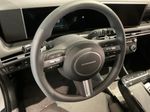 2026 Hyundai Tucson Hybrid SEL — White Pearl interior and detail view 14, for sale at McGrath Ford in Hiawatha, IA