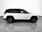 2023 Jeep Grand Cherokee Trailhawk 4xe — Bright White Clearcoat exterior view 8, for sale at Legend  Auto Sales in Puyallup, WA