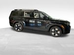 2026 Hyundai Santa Fe Hybrid SEL — Phantom Black exterior view 2, for sale at McGrath Ford in Hiawatha, IA