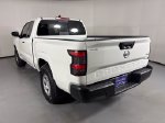 2026 Nissan Frontier S — Glacier White exterior view 6, for sale at Courtesy Nissan of Mesa in Mesa, AZ