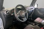 2011 Jeep Wrangler Sport — Bright Silver Metallic interior and detail view 14, for sale at Lakeside Automotive Group in Spring Lake, MI
