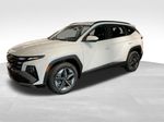 2026 Hyundai Tucson Hybrid SEL — White Pearl exterior view 7, for sale at McGrath Ford in Hiawatha, IA