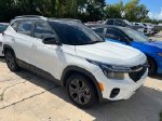 2024 Kia Seltos S — Clear White exterior view 2, for sale at Lakeshore CDJR in Slidell, LA