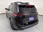 2026 Nissan Rogue Rock Creek — Super Black exterior view 6, for sale at Courtesy Nissan of Mesa in Mesa, AZ