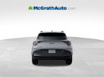 2026 Kia Sportage X-Pro Prestige — Gray exterior view 6, for sale at McGrath Ford in Hiawatha, IA