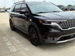 2024 Kia Carnival SX — Aurora Black exterior view 2, for sale at Velocity Auto Source in RICHMOND, KY