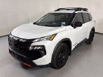 2026 Nissan Rogue Rock Creek — White Pearl exterior view 4, for sale at Courtesy Nissan of Mesa in Mesa, AZ