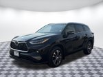 2021 Toyota Highlander XLE — Midnight Black Metallic exterior view 3, for sale at Bellingham Nissan in Bellingham, WA