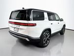 2024 Rivian R1S Adventure - Glacier White exterior view 6