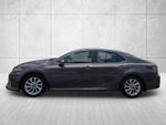 2024 Toyota Camry LE — Predawn Gray Mica exterior view 2, for sale at WALKER ACURA | DrivewithRJ in Metairie, LA