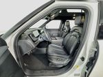 2024 Rivian R1S Adventure - Glacier White exterior view 11
