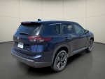 2024 Nissan Rogue SV — Deep Ocean Blue exterior view 7, for sale at Courtesy Nissan of Mesa in Mesa, AZ