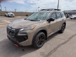 2026 Nissan Rogue Rock Creek — Baja Storm Metallic exterior view 3, for sale at Courtesy Nissan of Mesa in Mesa, AZ