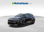 2027 Kia Sportage Hybrid SX-Prestige — Fusion Black exterior view 2, for sale at McGrath Ford in Hiawatha, IA