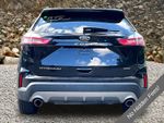 2023 Ford Edge Titanium — Black Metallic exterior view 4, for sale at A Better Way Wholesale Autos in Naugatuck, CT