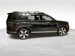 2026 Hyundai Santa Fe Limited — Phantom Black exterior view 3, for sale at McGrath Ford in Hiawatha, IA