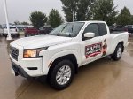 2022 Nissan Frontier SV — Glacier White exterior view 4, for sale at McGrath Ford in Hiawatha, IA