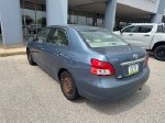 2009 Toyota Yaris Base — Pacific Blue Metallic exterior view 6, for sale at McGrath Ford in Hiawatha, IA