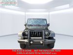 2016 Jeep Wrangler Unlimited Sport — Black Clearcoat exterior view 2, for sale at Shift Innovations Car Co in Puyallup, WA