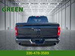 2023 Ford F-150 XLT — Black Metallic exterior view 4, for sale at Green Ford in Greensboro, NC