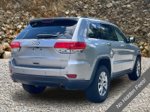 2015 Jeep Grand Cherokee Limited — Billet Silver Metallic exterior view 2, for sale at A Better Way Wholesale Autos in Naugatuck, CT