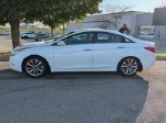 2011 Hyundai Sonata SE — Pearl White exterior view 4, for sale at McGrath Ford in Hiawatha, IA