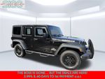 2016 Jeep Wrangler Unlimited Sport — Black Clearcoat interior and detail view 9, for sale at Shift Innovations Car Co in Puyallup, WA