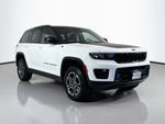 2023 Jeep Grand Cherokee Trailhawk 4xe — Bright White Clearcoat exterior view 4, for sale at Legend  Auto Sales in Puyallup, WA