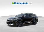2027 Kia Sportage Hybrid SX-Prestige — Fusion Black exterior view 5, for sale at McGrath Ford in Hiawatha, IA
