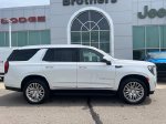 2024 GMC Yukon Denali — White Frost exterior view 5, for sale at Williams Brothers Dodge Chrysler Jeep Ram of Dundee in Dundee, MI