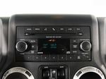 2015 Jeep Wrangler Unlimited Freedom Edition — Red interior and detail view 16, for sale at RDS Ineos Grenadier in Devon, PA
