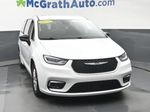 2024 Chrysler Pacifica Touring L — Bright White Clearcoat exterior view 5, for sale at McGrath Ford in Hiawatha, IA