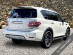 2017 Nissan Armada Platinum — Pearl White exterior view 2, for sale at A Better Way Wholesale Autos in Naugatuck, CT