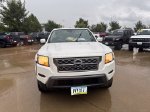 2022 Nissan Frontier SV — Glacier White exterior view 2, for sale at McGrath Ford in Hiawatha, IA